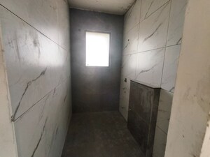 Bathroom in 3 BHK Apartment at Dhakoli – for Sale