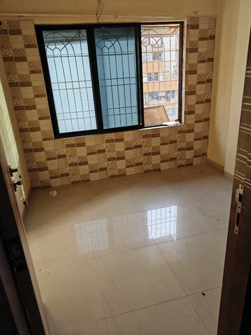 Kitchen in 1 BHK Apartment at Seawoods – for Sale