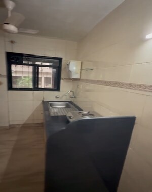 Kitchen in 2 BHK Apartment at Swami Tower, Chembur – for Rent