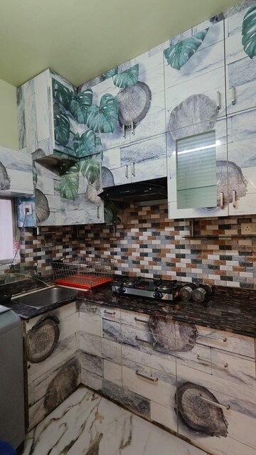 Kitchen in 2 BHK Apartment at Sureka Sunrise Symphony, Rajarhat – for Sale