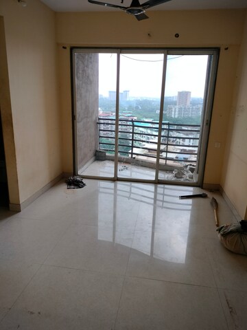 Living Room in 1 BHK Apartment at Ajmera New Era, Kalyan West – for Rent