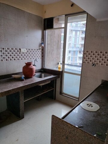 Kitchen in 1 BHK Apartment at Ajmera New Era, Kalyan West – for Rent