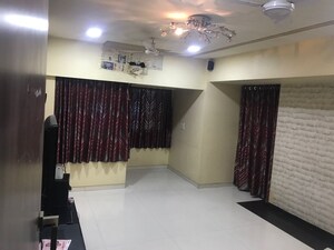 Living Room in 1 BHK Apartment at Prayatna Apartment, Kurla East – for Sale