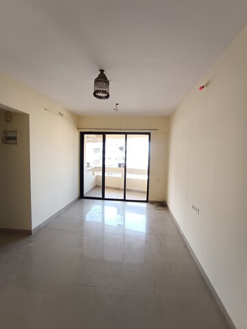 Living Room in 1 BHK Apartment at Ajmera Yogi Dham Phase III, Kalyan West – for Sale