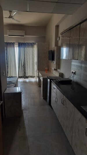 Kitchen in 1 RK Apartment at Paramount Oak, Zeta I Greater Noida – for Rent