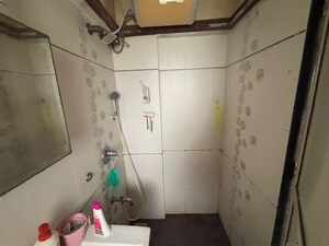 Bathroom in 1 BHK Apartment at Aditya CHS Kandivali West, Kandivali West – for Sale