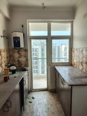 Kitchen in 2.5 BHK Apartment at Amrapali Leisure Park, Amrapali Leisure Valley – for Rent