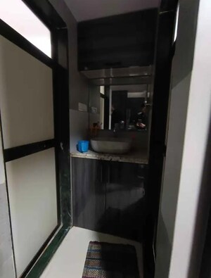 Bathroom in 1 BHK Apartment at Ram Granth CHS, Mira Road – for Rent