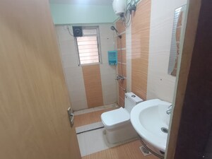 Bathroom in 3 BHK Apartment at Anmol Tower, Goregaon West – for Rent