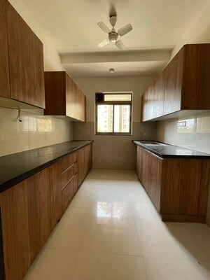 Kitchen in 1.5 BHK Apartment at Lodha Splendora Platino, Ghodbunder Road – for Sale