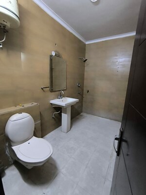 Bathroom in 4 BHK Builder Floor at Green Fields Colony – for Rent