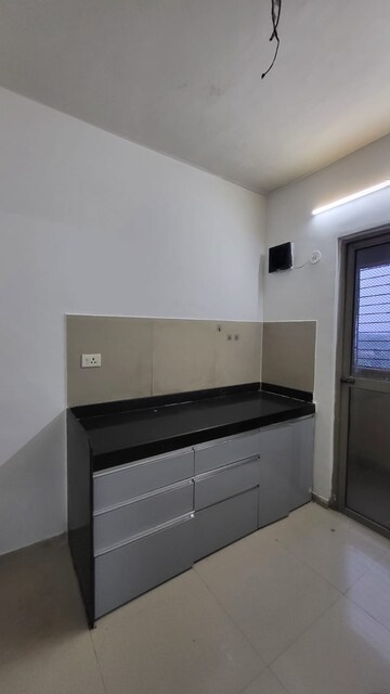Kitchen in 1.5 BHK Apartment at Lodha Palava Casa Rio Caspiana, Dombivli East – for Rent