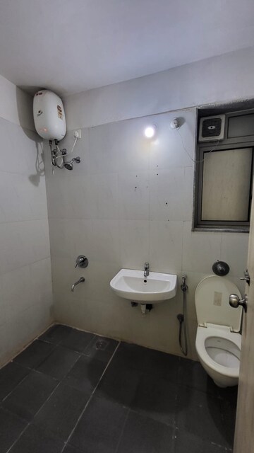 Bathroom in 1.5 BHK Apartment at Lodha Palava Casa Rio Caspiana, Dombivli East – for Rent