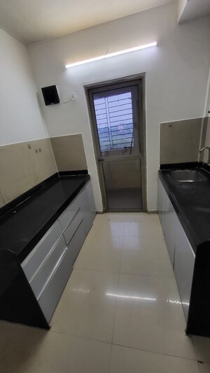 Kitchen in 1.5 BHK Apartment at Lodha Palava Casa Rio Caspiana, Dombivli East – for Rent