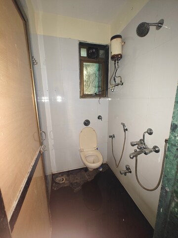 Bathroom in 3.5 BHK Apartment at Rukmini Chaya Apartment, Seawoods – for Rent