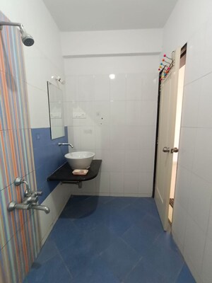 Bathroom in 3 BHK Apartment at Swiss County, Thergaon – for Sale