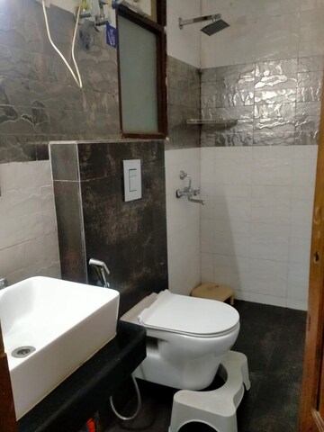 Bathroom in 3 BHK Apartment at Ansal Sushant Lok I, Sector 43 – for Rent