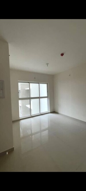 Living Room in 1 BHK Apartment at Lodha Amara, Kolshet Road – for Rent