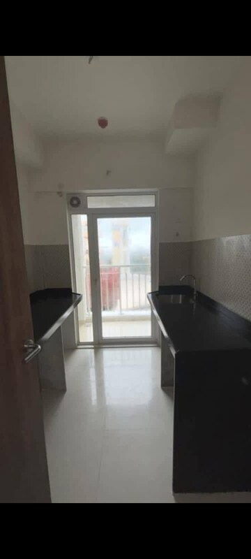 Kitchen in 1 BHK Apartment at Lodha Amara, Kolshet Road – for Rent