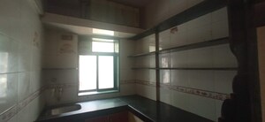 Kitchen in 1 BHK Apartment at Sukh Angan CHS, Nalasopara West – for Sale
