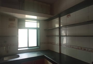 Kitchen in 1 BHK Apartment at Sukh Angan CHS, Nalasopara West – for Sale
