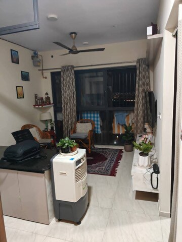 Living Room in 1 BHK Apartment at Lodha Crown Quality Homes, Majiwada – for Rent