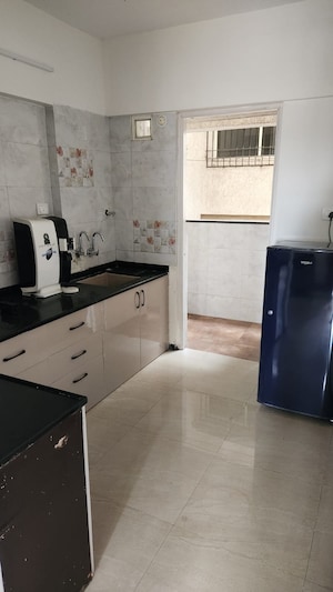 Kitchen in 2 BHK Apartment at Arun Sheth Sanskriti, Wakad – for Sale