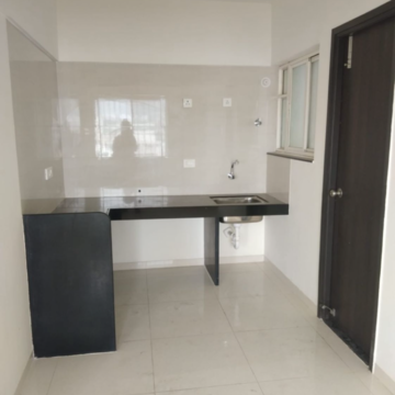 Kitchen in 1 BHK Apartment at Paranjape Schemes Abhiruchi Parisar, Nere – for Sale