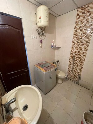 Bathroom in 3 BHK Apartment at Hazratganj – for Sale