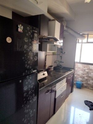 Kitchen in 2 BHK Apartment at M R Galaxy Royale, Goregaon West – for Rent
