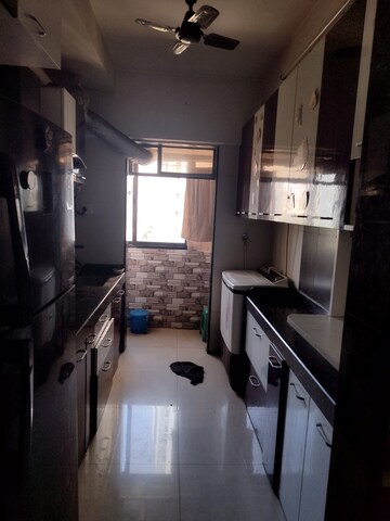Kitchen in 2 BHK Apartment at M R Galaxy Royale, Goregaon West – for Rent