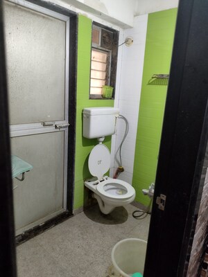 Bathroom in 2 BHK Apartment at M R Galaxy Royale, Goregaon West – for Rent