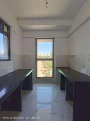 Kitchen in 1 BHK Apartment at Raymond Ten X Habitat, Pokhran Road No Two – for Rent