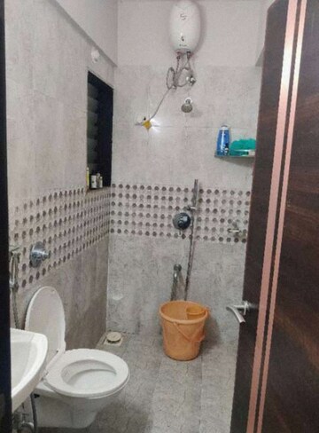 Bathroom in 2 BHK Apartment at Kishor Sukur Enclave A, Ghodbunder Road – for Rent