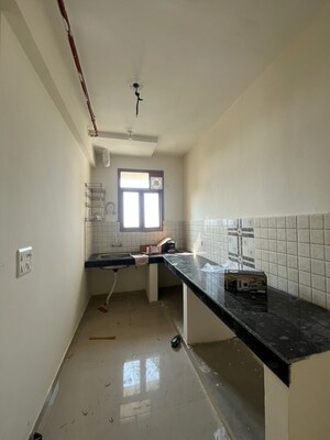 Kitchen in 2 BHK Apartment at Pareena Om Apartments, Sector 112 – for Rent