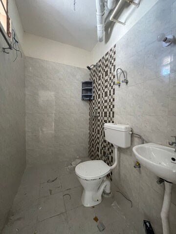 Bathroom in 2 BHK Apartment at Pareena Om Apartments, Sector 112 – for Rent