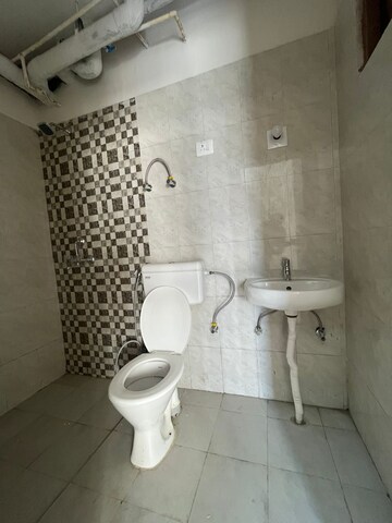 Bathroom in 2 BHK Apartment at Pareena Om Apartments, Sector 112 – for Rent