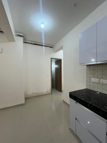 Kitchen in 2 BHK Apartment at Pareena Om Apartments, Sector 112 – for Sale