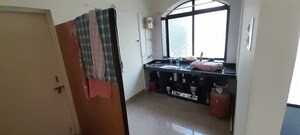 Kitchen in 1 BHK Apartment at Saurabh CHS Karve Nagar, Karve Nagar – for Sale