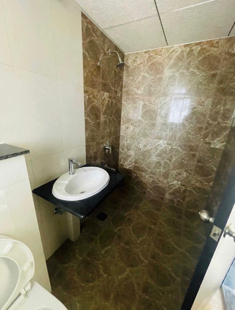 Bathroom, kolte-patil-life-republic 2 Bedroom 850 Sq.Ft. Apartment In Hinjewadi Pune 9319340