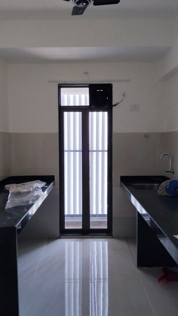 Kitchen in 2 BHK Apartment at Runwal My City Phase II Cluster 05, Dombivli East – for Rent