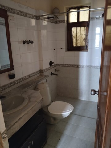 Bathroom in 3 BHK Apartment at ATS Green II, Sector 50 – for Rent