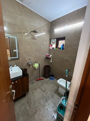 Bathroom in 2 BHK Apartment at Ramprastha Colony – for Sale
