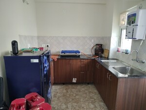 Kitchen in 2.5 BHK Apartment at Amrapali Centurian Park Phase II, Tech Zone 4 Greater Noida – for Rent