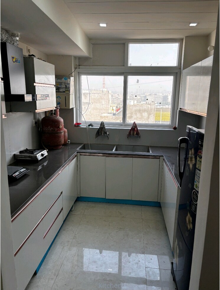 Kitchen, aura-homes 2 Bedroom 1050 Sq.Ft. Apartment In Patiala Road Zirakpur 9319658