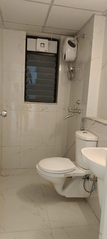 Bathroom in 2 BHK Apartment at Runwal Gardens Phase 2, Dombivli East – for Rent