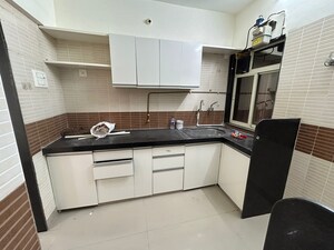 Kitchen in 1 BHK Apartment at Hiranandani Estate Queens Gate, Ghodbunder Road – for Rent