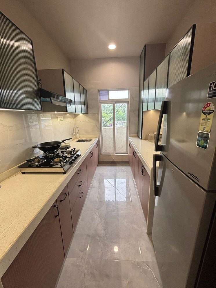 Kitchen, godrej-emerald 1.5 Bedroom 450 Sq.Ft. Apartment In Ghodbunder Road Thane 9319776