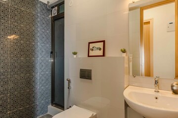 Bathroom in 2 BHK Apartment at Raj Infinia, Malad West – for Sale