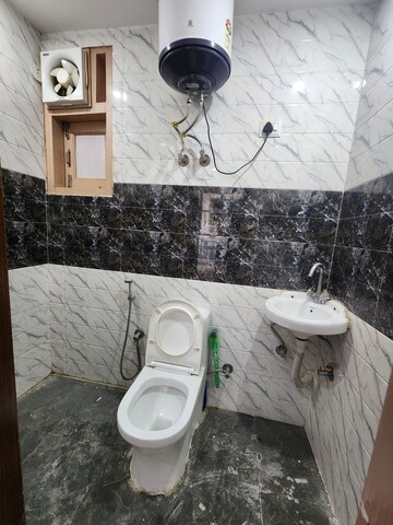 Bathroom in 2 BHK Builder Floor at Chattarpur – for Rent